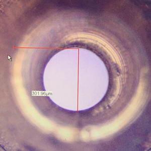Under Microscope Hole Drilling